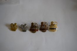 Five BR railway cap Badges in good condition: 2 x scarce 1950-1956 issue lion astride a wheel gilded