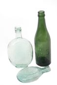 Three glass bottles: 2 x Midland Hotel Derby, flat clear glass, 14 and 18cm long, together with 1