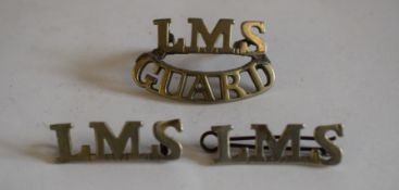 Three LMS nickel railway Badges : 1 x ‘LMS GUARD’ with two blade fittings, one broken, and