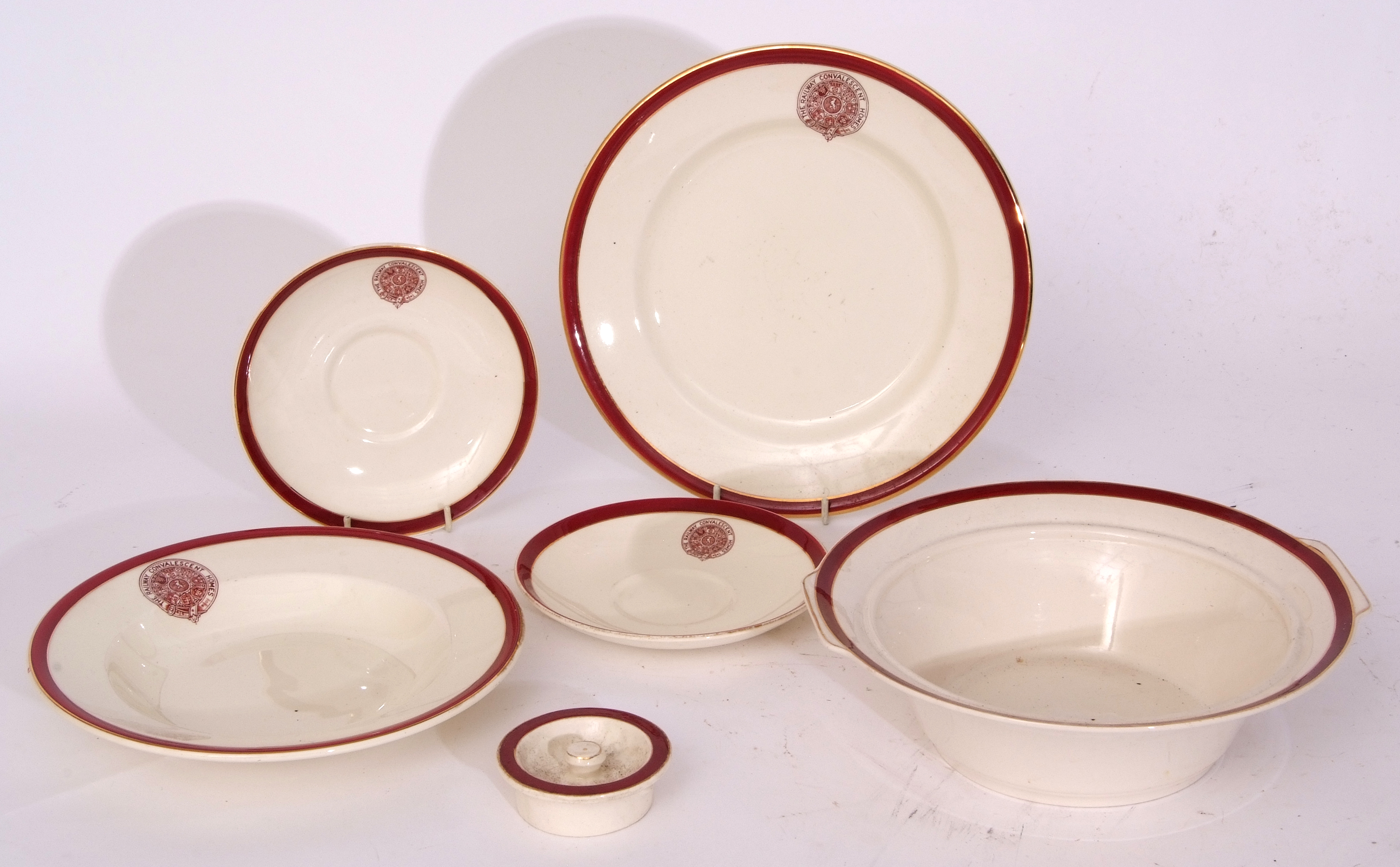 Red/white china ‘The Railway Convalescent Home’, a similar lot comprising: 25 x shallow dish 23cm