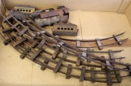 ‘O’ gauge train set comprising a 136cm diameter circle of rusty track with wooden sleepers in 6