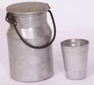 Unmarked miniature churn in aluminium 15cm high x 9cm dia, dented, together with small aluminium cup