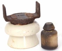 Railway interest: Insulator for supporting a conductor rail, date stamped 1965, together with a