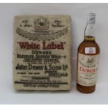 Dewar's - 26 fl oz, 70° proof Whisky t/w Cake in form of Dewar’s Whisky Label, one bottle.