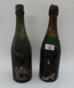 One bottle of 1961 Krug Champagne, and a further bottle of Krug (believed 1961). (2)