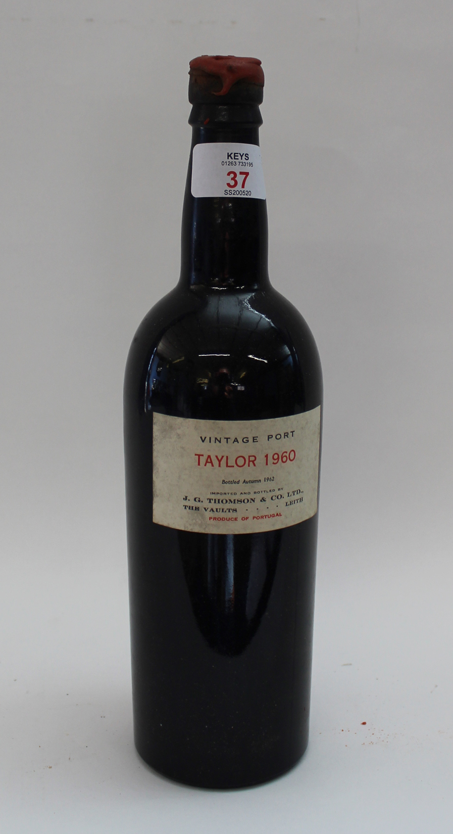 1960 Taylor Vintage Port together with original wooden case, one bottle.