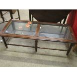 Glass-top mahogany Coffee Table, approx 127 x 34cm