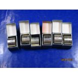 Collection of six boxed hallmarked silver Napkin Rings