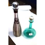 Two cut glass decanters