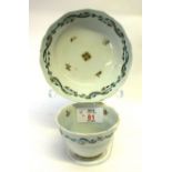 Lowestoft porcelain tea bowl and saucer, the ogee shaped tea bowl with a feather pattern and similar