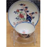 18th century Lowestoft porcelain tea bowl and saucer decorated with a polychrome design in