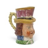 Staffordshire Toby Jug with polychrome decoration, possibly of Paul Pry, 14cm high