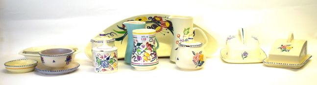 Group of Poole pottery wares including 2 jugs, 2 chesse dishes and covers and various bowls all with