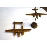 Two brass models of aircraft, one of a Liberator, the other of a Lockheed Lightning (2)