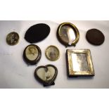 Collection of late Victorian photo frames, some with white metal and also brass frames, (7)
