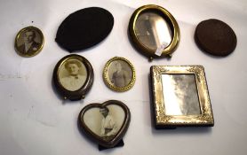 Collection of late Victorian photo frames, some with white metal and also brass frames, (7)