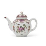 18th century Lowestoft porcelain tea pot with a polychrome design of floral sprays in so-called