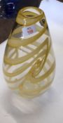 Early large glass vase decorated with yellow swirls with Murano sticker to side