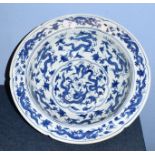 Large Chinese porcelain punch bowl of lobed shape, decorated in under glaze blue, Kangxi style