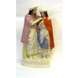 Staffordshire group entitled 'The Prodigals Return', 37cm high