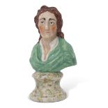 Staffordshire bust, probably of Voltaire, on marble effect plinth, 19cm high