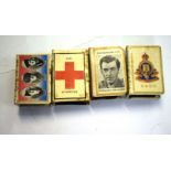Group of four matchbox holders