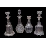 Group of four 19th century cut glass decanters of various shapes and sizes, largest 32cm high (4)