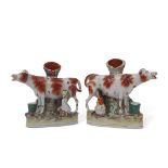 Pair of Staffordshire milking groups, both decorated in typical fashion with milkmaids and the