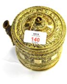 Brass string holder with relief decoration, 10cm high