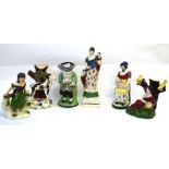 Group of Scottish pottery, probably Portobello, including model of a sheperdess, model of Charity, a