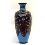 Large cloisonne vase of faceted form with decoration of mythical beasts and flowers on a turquoise