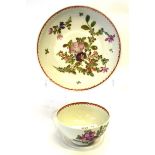 Lowestoft porcelain tea bowl and saucer decorated in polychrome with Thomas Rose pattern of floral