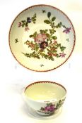 Lowestoft porcelain tea bowl and saucer decorated in polychrome with Thomas Rose pattern of floral