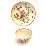 Lowestoft porcelain tea bowl and saucer decorated in polychrome with Thomas Rose design