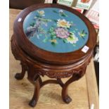 Unusual Eastern Oriental hardwood circular occasional table inset with a floral cloisonne panel