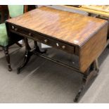 Regency period mahogany sofa table, two drop flaps fitted on either side with drawers and dummy