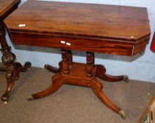 Regency period mahogany card table, fold top with canted front corners and ebonised line inlay