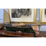 Late 19th/early 20th century painted wooden model of a sailing cargo boat on stand, 113cm wide x