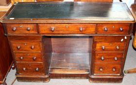 Victorian mahogany twin pedestal desk, the frieze fitted with three drawers raised on two pedestals,