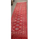 Long Bokhara type wool runner in red, black and beige, 78cm x 304cm