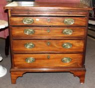 George III period mahogany bachelor's chest, brushing slide over four full width graduated drawers