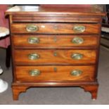 George III period mahogany bachelor's chest, brushing slide over four full width graduated drawers