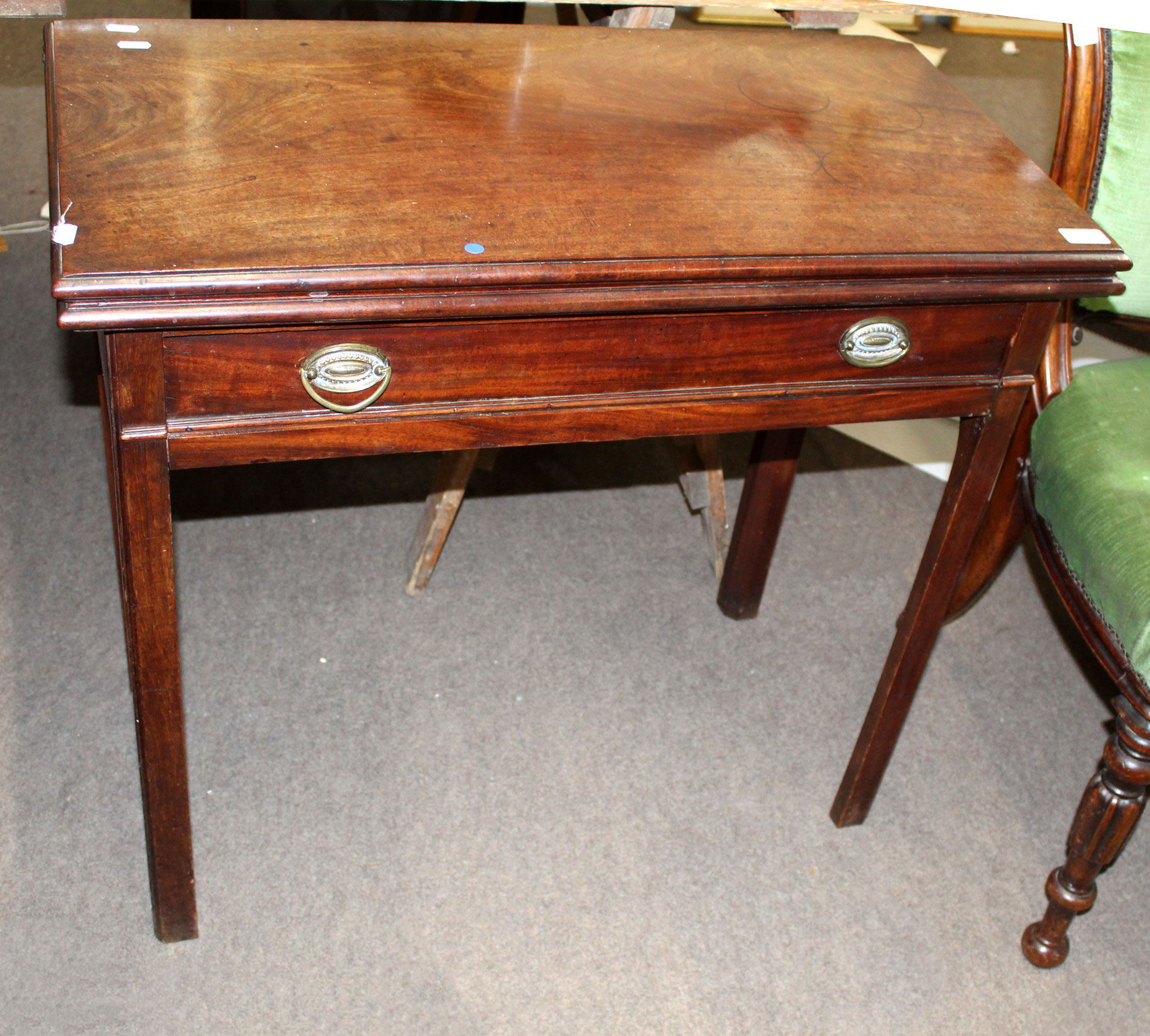George III period mahogany fold-top tea table with full width frieze drawer on chamfered supports,