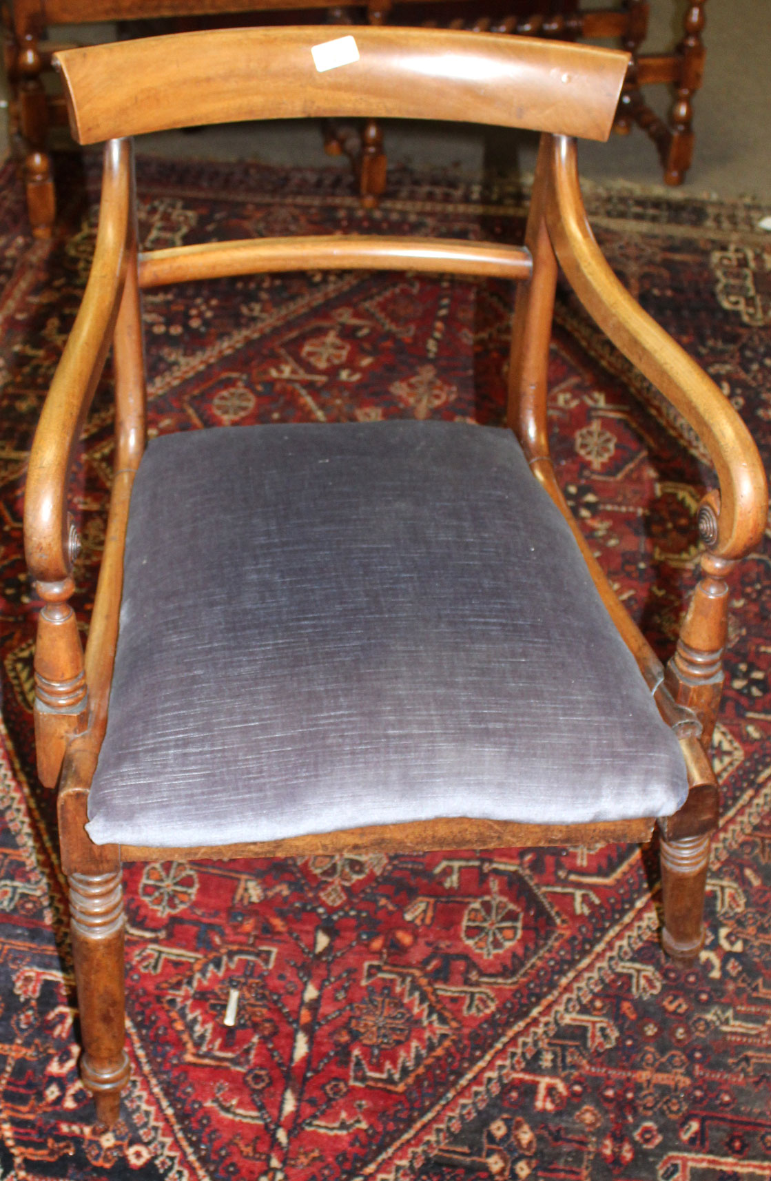 Regency period mahogany bar back carver chair raised on ring turned front supports with peg feet