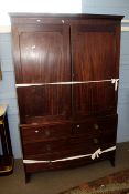 Early 19th century mahogany linen press, two moulded doors over two short and two full width drawers