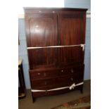 Early 19th century mahogany linen press, two moulded doors over two short and two full width drawers