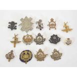 Quantity of 14 various WWI and Edwardian period British Cyclists Regiment cap badges to include 2