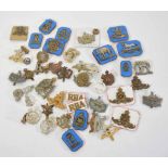 Mixed quantity of military cap badges, varying dates and crowns to include Royal Armoured Corps,