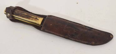 Bowie knife and leather sheath by Whitby Foreign stamp to ricasso, stamped "Original Bowie knife" to
