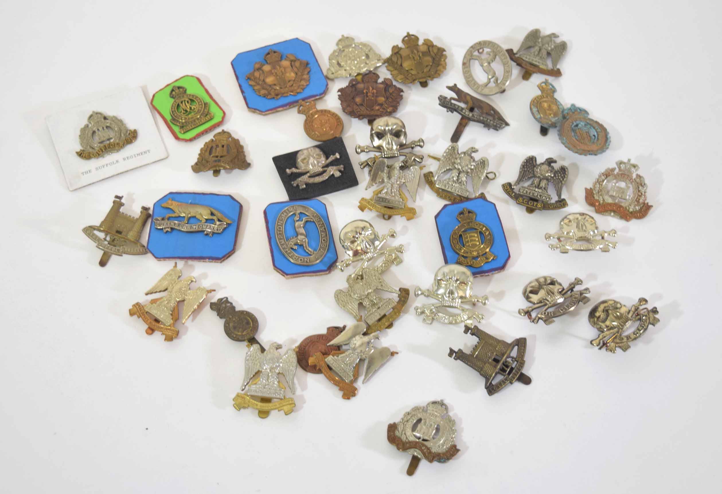 Mixed quantity of military cap badges, varying crowns and dates to include Royal Scots Greys,